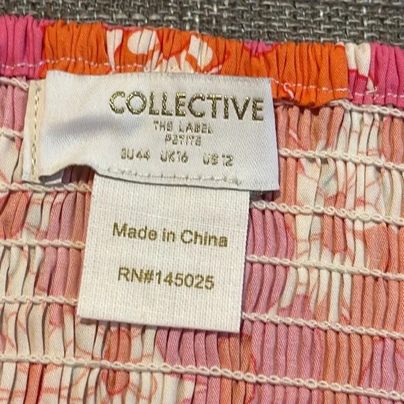 Collective the Label Petite exclusive frill hem mini skirt in 60s floral… - Picture 11 of 16